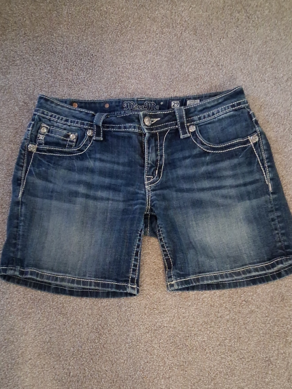 Miss Me Blue Washed Jean Mid Shorts. Embroidered Fleur-De-lis Pocket Design(29)
